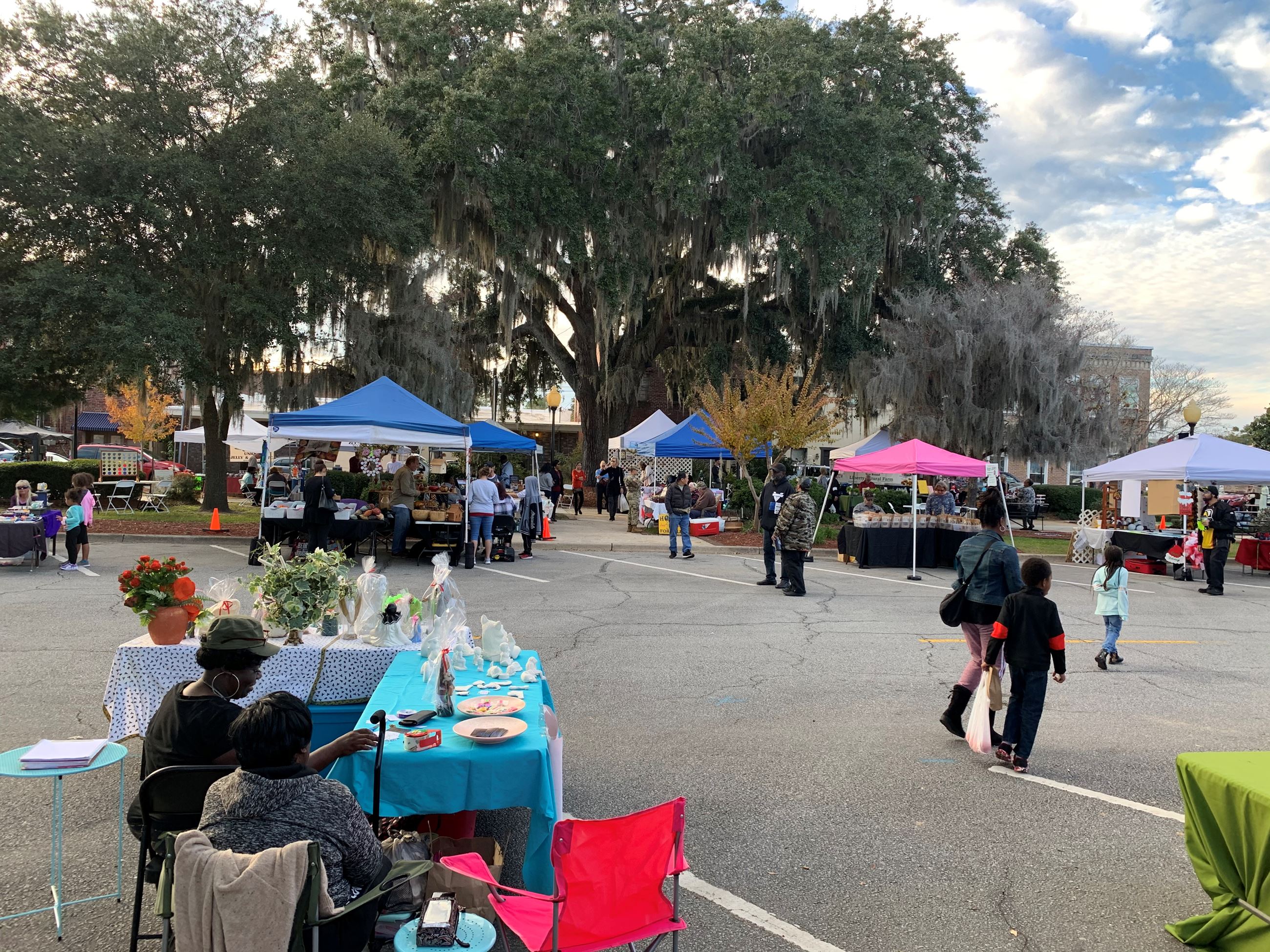 Event patrons peruse vendors during the November 2019 Homegrown and Handmade Market in downtown Hine